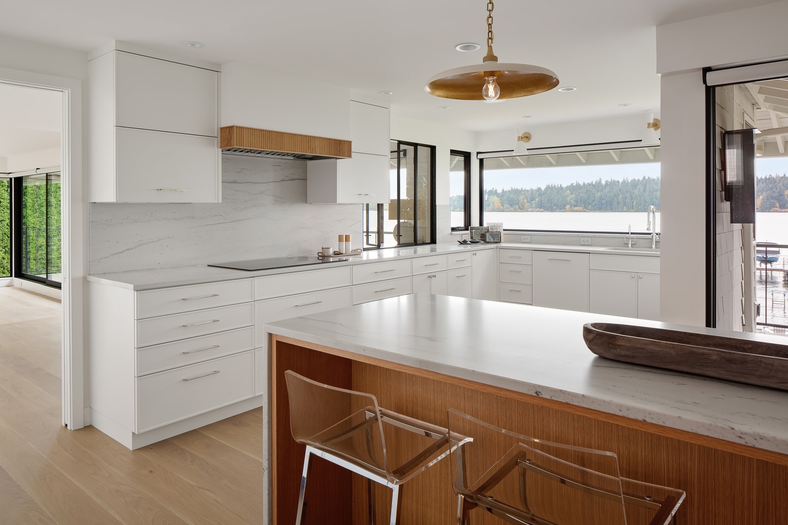 Luxury coastal interior design by ID by Gwen - Elegant Mercer Island retreat with panoramic ocean views and refined designer details